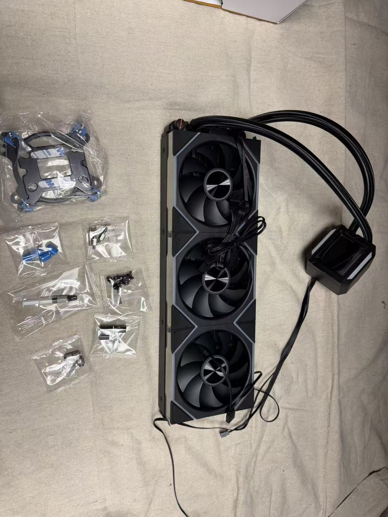 HotBell HB3XCF1 black 360mm liquid CPU cooler kit with triple-fan radiator, display pump, tubing, and mounting hardware