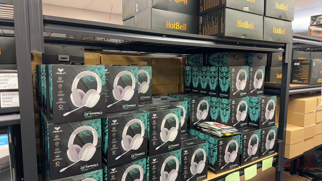 HotBell Wind G7PRO gaming headset inventory displayed in retail packaging on shelves at the HotBell warehouse.