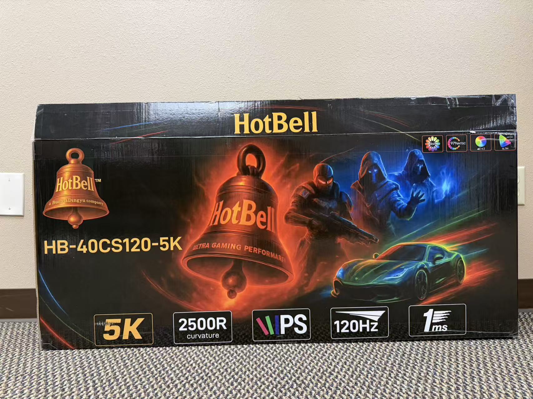 HotBell HB-40CS120-5K retail packaging showing 5K resolution, 2500R curvature, IPS panel, 120Hz refresh rate, and 1ms response time
